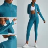 Zipper up sport jacket thumb hole for woman made in China - Image 2