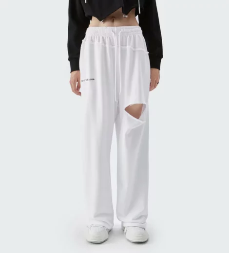 Woman loose track pants with rips wholesale