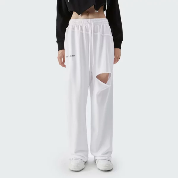 Woman loose track pants with rips wholesale