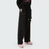 Woman loose track pants with rips wholesale - Image 3