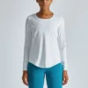 woman long sleeve nylon gym t-shirt with curved hem - Image 12