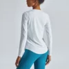 woman long sleeve nylon gym t-shirt with curved hem - Image 11