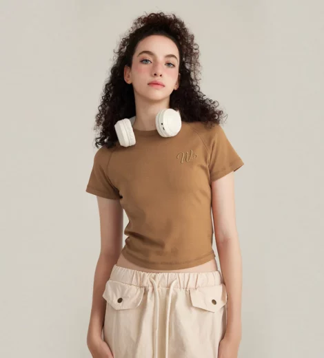 woman tight fit cropped baby t-shirt with curved hem