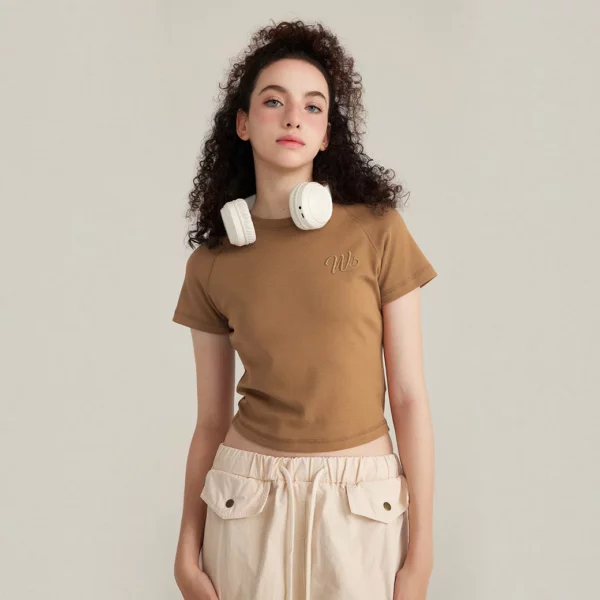 woman tight fit cropped baby t-shirt with curved hem