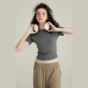 woman tight fit cropped baby t-shirt with curved hem - Image 6
