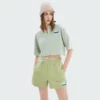 woman zip up cropped t-shirt with polo neck and drawstring sides - Image 3