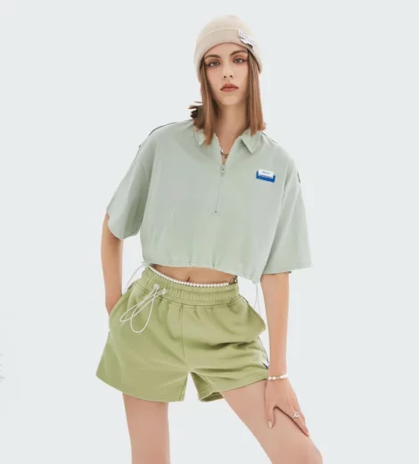 woman zip up cropped t-shirt with polo neck and drawstring sides