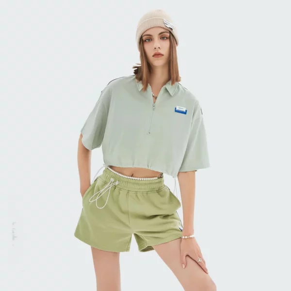 woman zip up cropped t-shirt with polo neck and drawstring sides